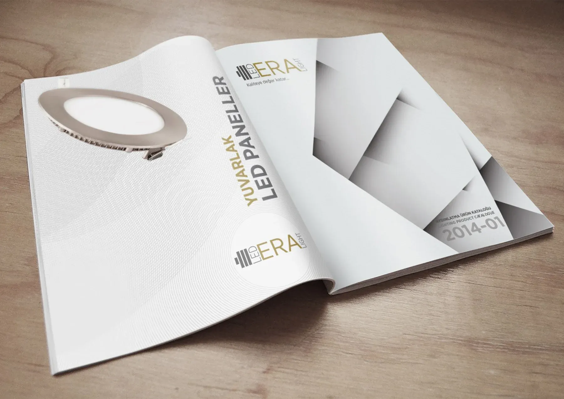 An ERA LED Light catalogue with white geometric forms and a large circular lighting panel