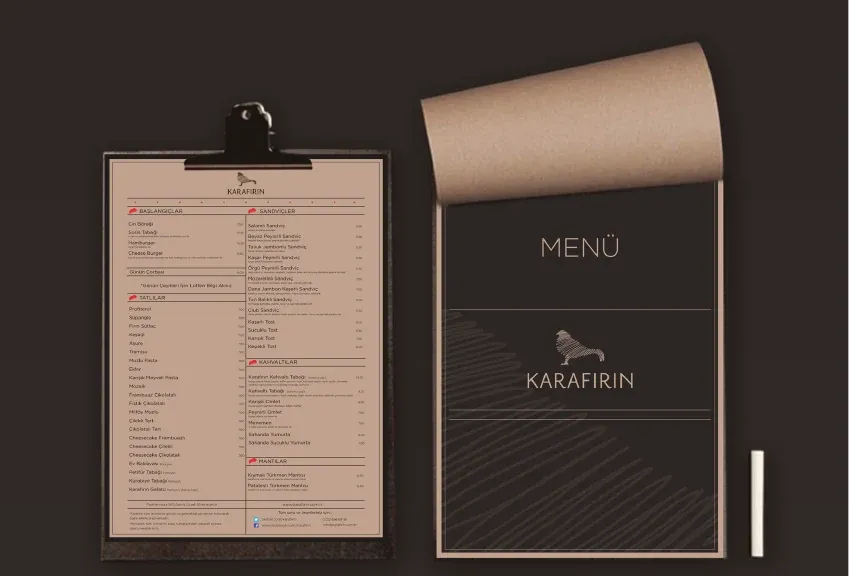 Karafırın menu on a clipboard beside its dark printed cover